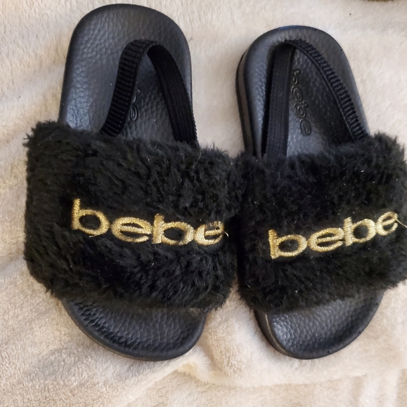 Bebe sandal size large 9/10 Black And Gold - Picture 1 of 5